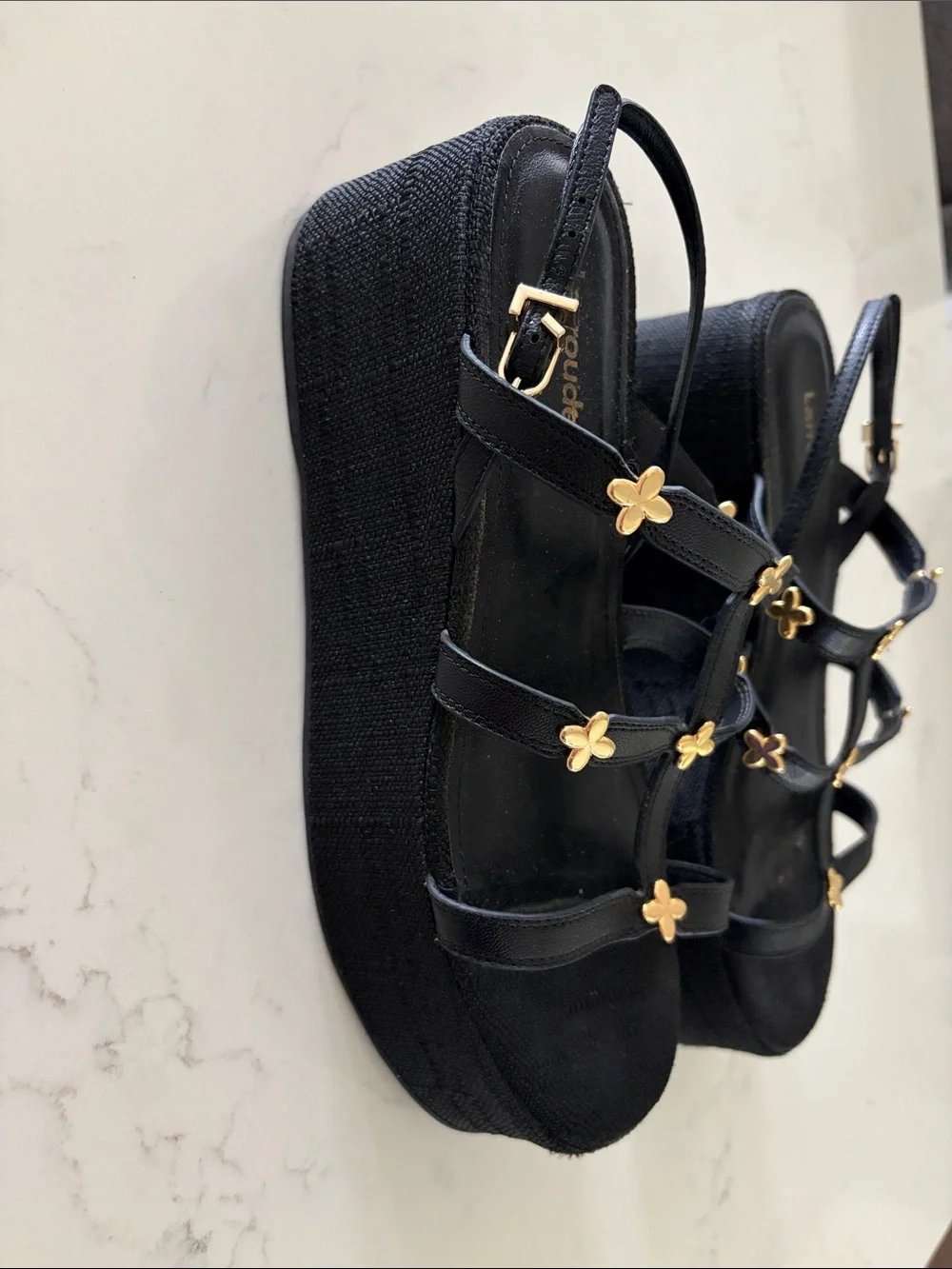 Larroude Black Harmony Sandals with Gold Flower Accents